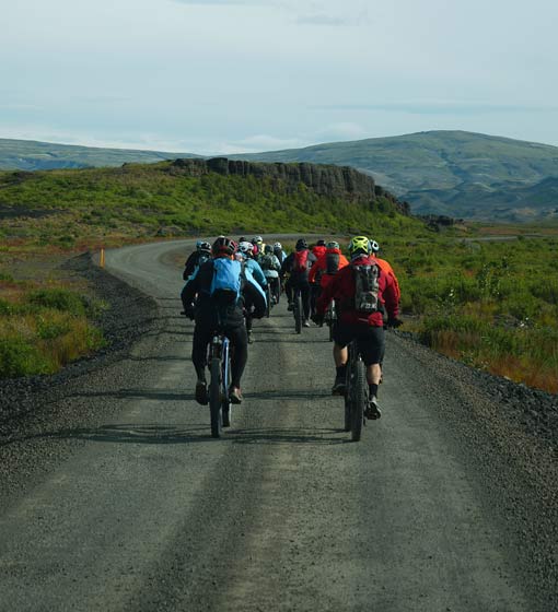 Small group e-bike tour riding on the way to Gjain